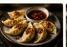 Dumplings med kimchimajsfyllning & krispig vitlöksolja