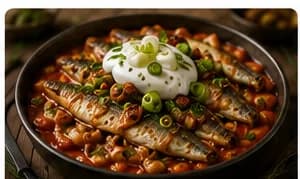 Stekt strömming i tomatsås med vita bönor & syrad grädde