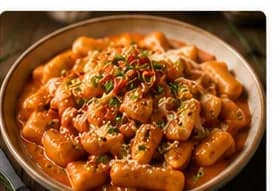 Tteokbokki med krämig rosésås & parmesan