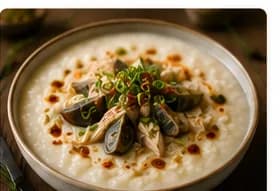 Congee med ingefära, kyckling & century egg